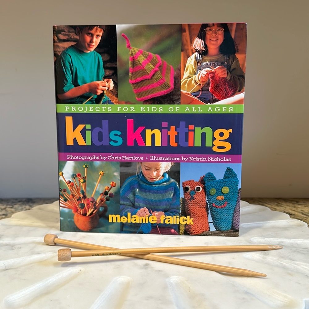 Kids Knitting Book and a pair of knitting needles